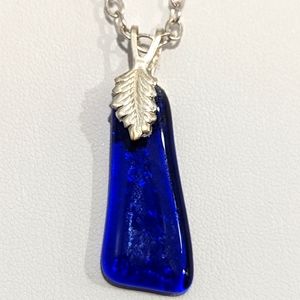 Artisan Handmade blue glass drop necklace with silver leaf finding.